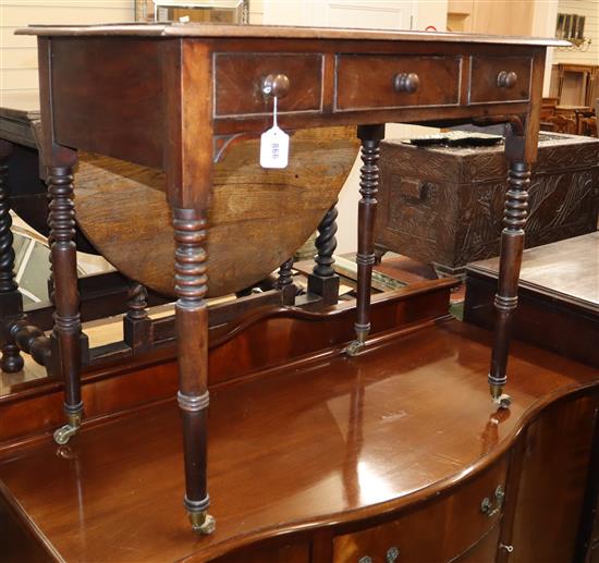 A Victorian mahogany leather inlaid writing table W.89cm